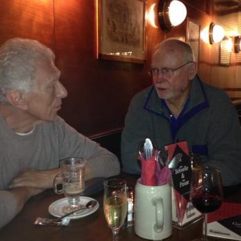 Harvey Burns with friends, laughing and enjoying the moment